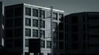 Una fachada sombreada de un edificio médico moderno en Kentucky acentuando detalles estructurales.