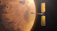 Ilustración digital de la nave espacial Space Reactor-1 (SR-1) en órbita en órbita cerca de Marte. El terreno rojo del planeta llena la mitad izquierda del marco. A la derecha, la nave