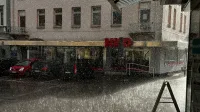 La lluvia cae en una calle de la ciudad en Bad Säckingen, Alemania, mostrando la vida urbana y el clima.