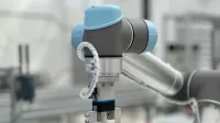Close-up of a robotic arm in a modern industrial environment, highlighting technology.