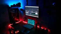 Cozy home office setup with ambient LED lighting, perfect for productivity and creativity.