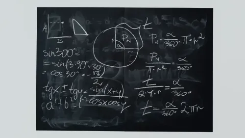 Detailed view of mathematical equations and diagrams on a blackboard.