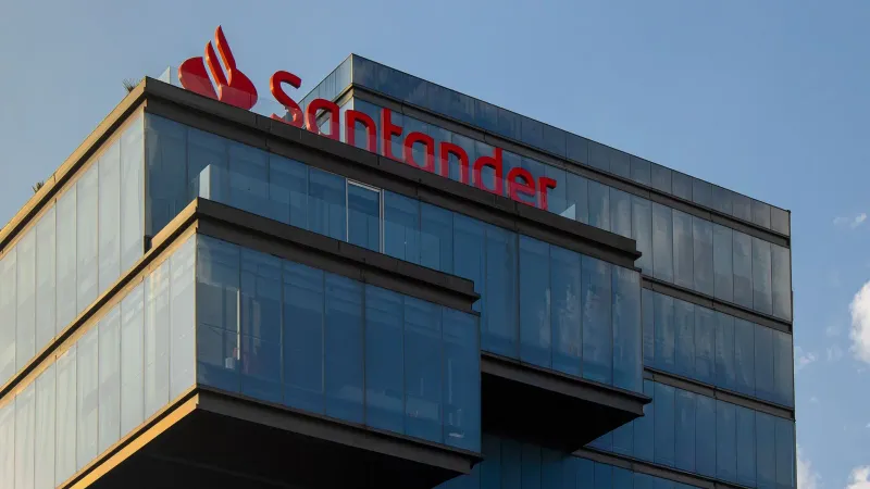 Exterior view of the modern Santander building in Puebla, Mexico, under a clear blue sky.