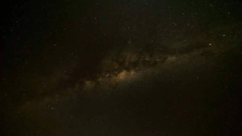 A breathtaking view of the Milky Way Galaxy captured on a clear night sky, showcasing countless stars.