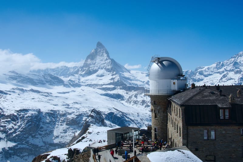 Snow-capped Matterhorn viewed from 3100 Kulmhotel Gornergrat under a clear blue sky.