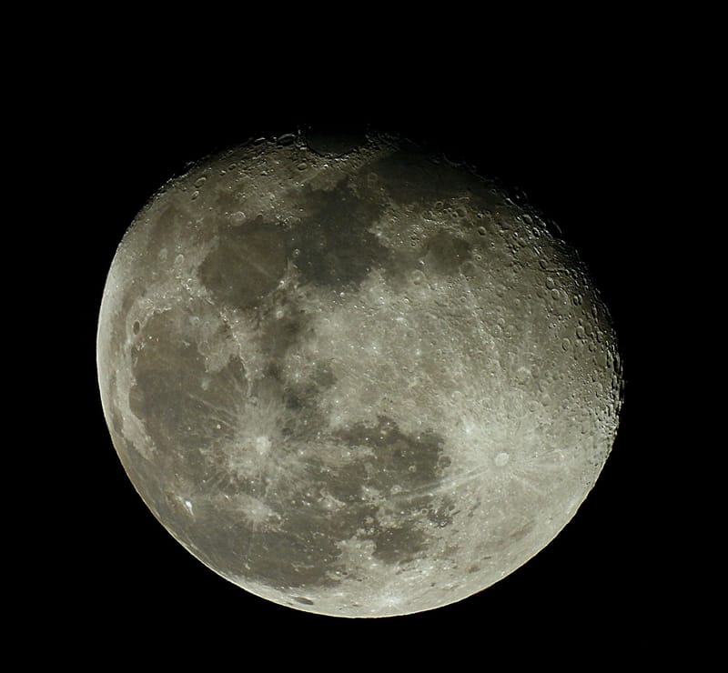 Detailed image of the moon showing craters and surface texture.