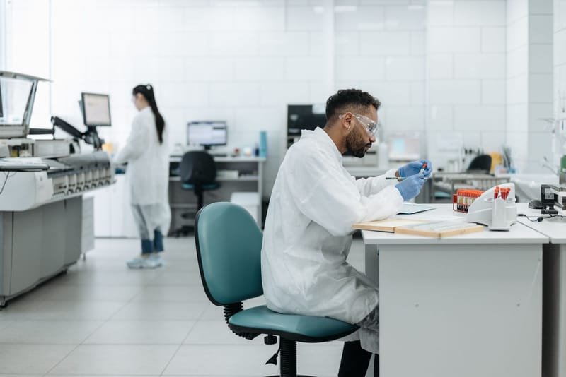 Researchers analyzing samples in a modern laboratory equipped with advanced technology.