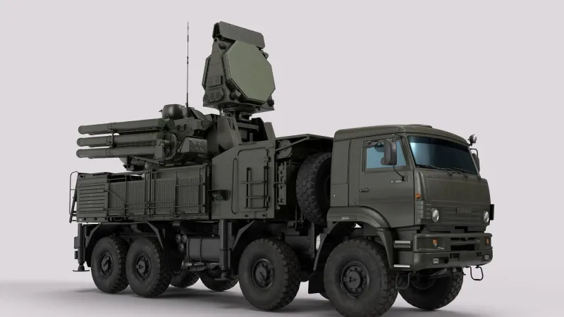 Detailed image of a military vehicle equipped with advanced radar and weaponry systems.