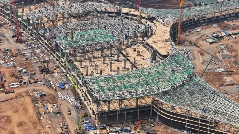 Aerial shot of a large-scale construction project with cranes in Đồng Nai, Việt Nam.