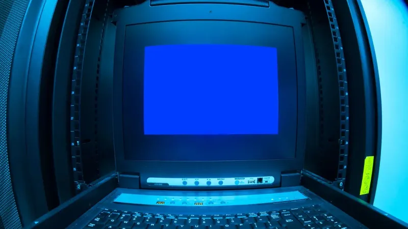 Close-up of a blue screen error shown on a data center control terminal.