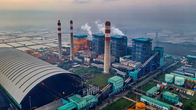 Aerial view of a large industrial plant in Banten, Indonesia, at dawn.