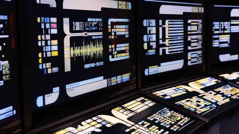 High-tech command center with advanced digital displays and control panels
