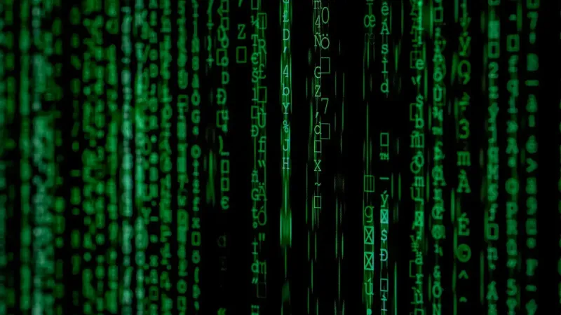 Abstract green matrix code background with binary style.