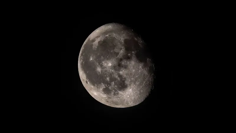 High-resolution image showcasing the detailed surface of the waxing gibbous moon.