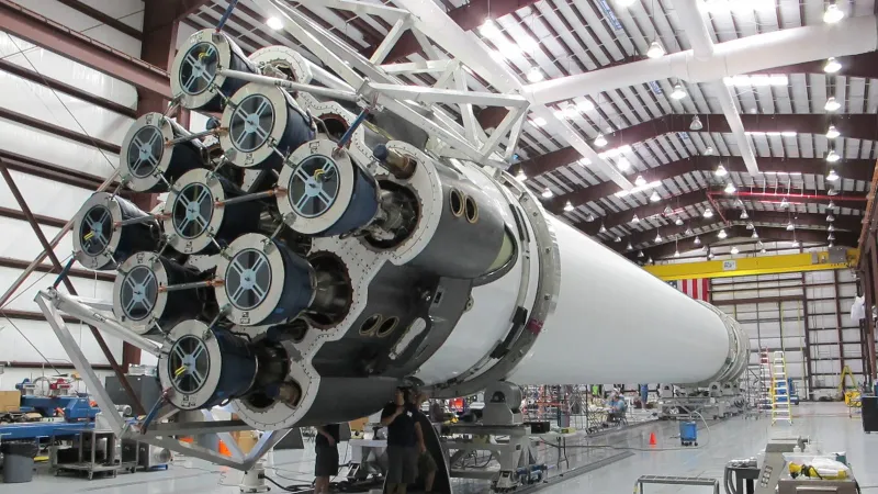 Low angle of innovative rocket core detail under construction at modern futuristic industrial factory