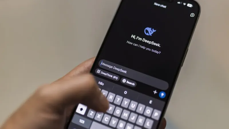A smartphone displaying the DeepSeek AI chat interface, depicting modern technology use.