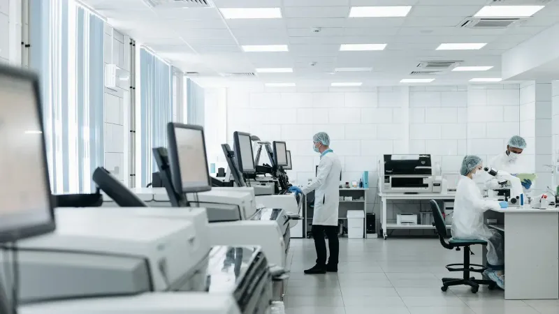 Scientists conducting research in a state-of-the-art laboratory with advanced equipment.