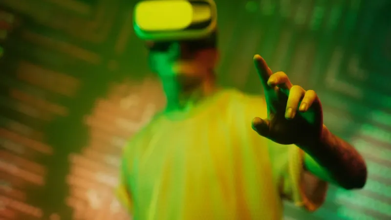 A man engaging with a virtual environment using a VR headset in a futuristic setting.
