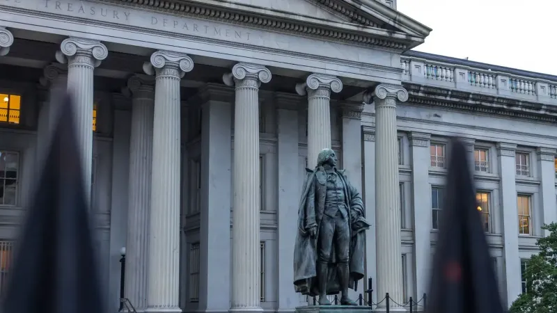 Statue of Albert Gallatin in front of the US Treasury Department building in Washington, DC.