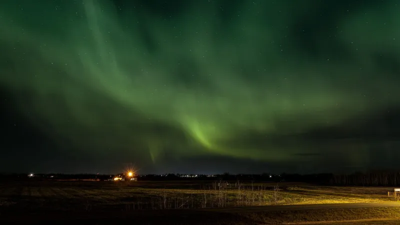 Captivating view of the Northern Lights illuminating the night sky over Lloydminster, Canada.