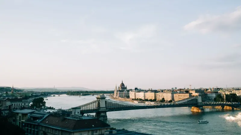 A picturesque view of Budapest featuring the Chain Bridge and Hungarian Parliament along the Danube River.