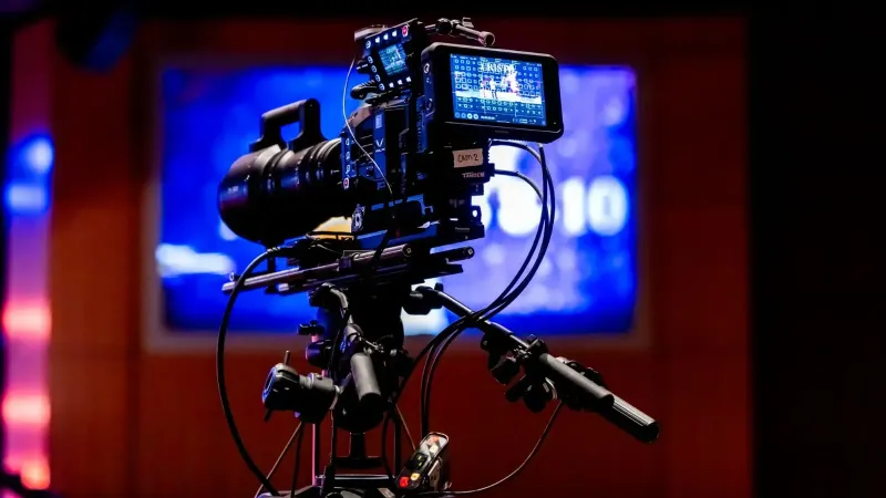 High-tech video camera setup in modern studio environment, showcasing professional equipment for filming.
