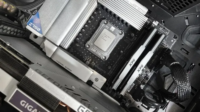 Interior view of a high-performance PC build featuring a Gigabyte motherboard and components.