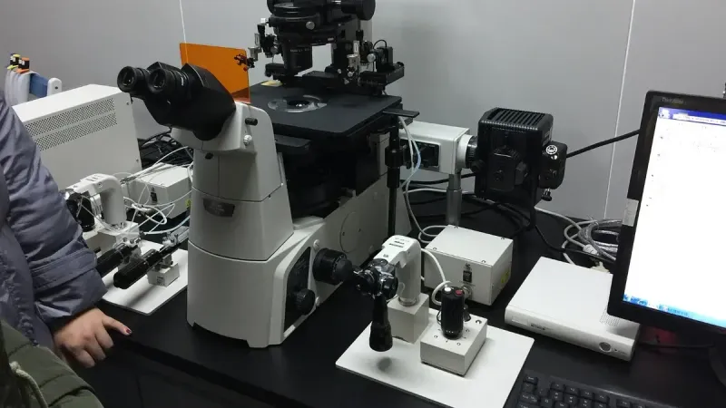 A Nikon Inverted fluorescence microscope in laboratory.