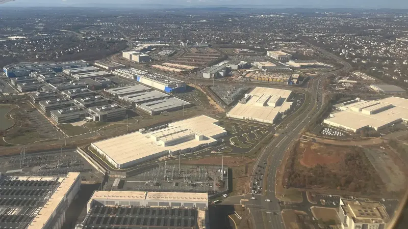 Aerial view of data centers intermingled with other commercial buildings in Loudoun County, near Ashburn