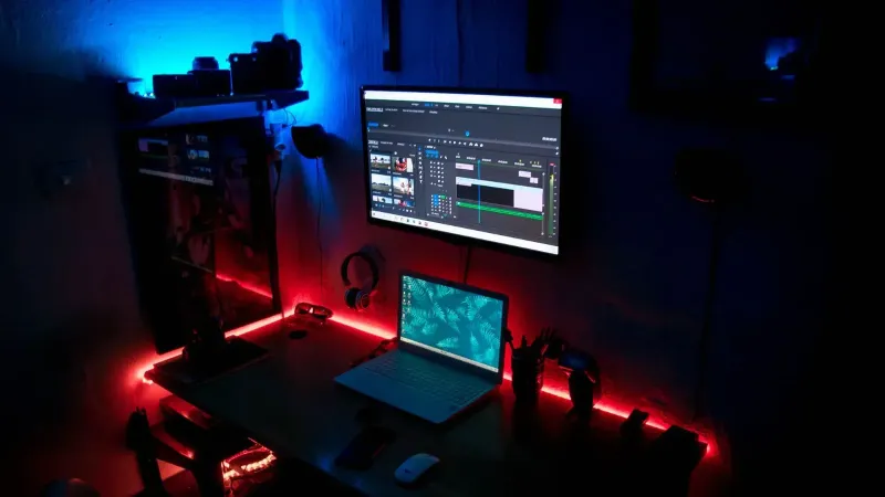 Cozy home office setup with ambient LED lighting, perfect for productivity and creativity.